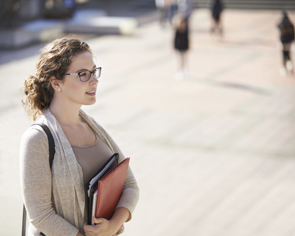 Shot of a beautiful young student on campushttp://195.154.178.81/DATA/i_collage/pu/shoots/804548.jpg