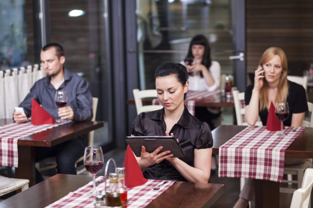 restaurant with people with bad habits