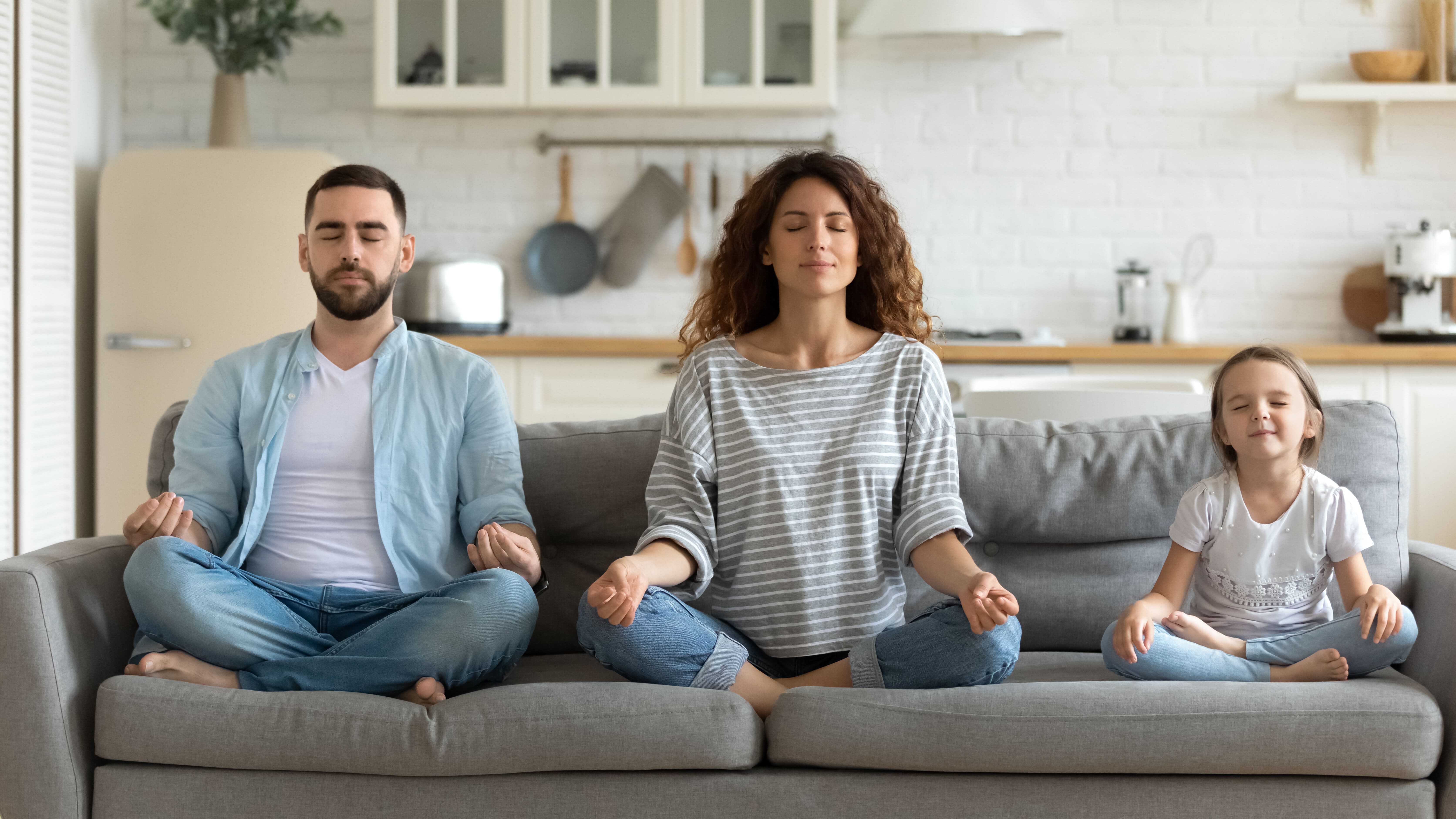 A family cultivating mindfulness to improve acceptance while being present